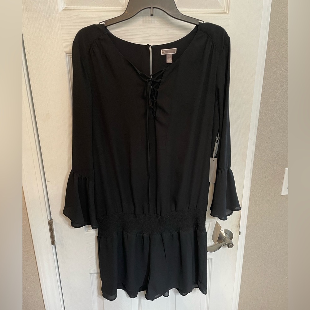 Black long sleeve shorts jumper.